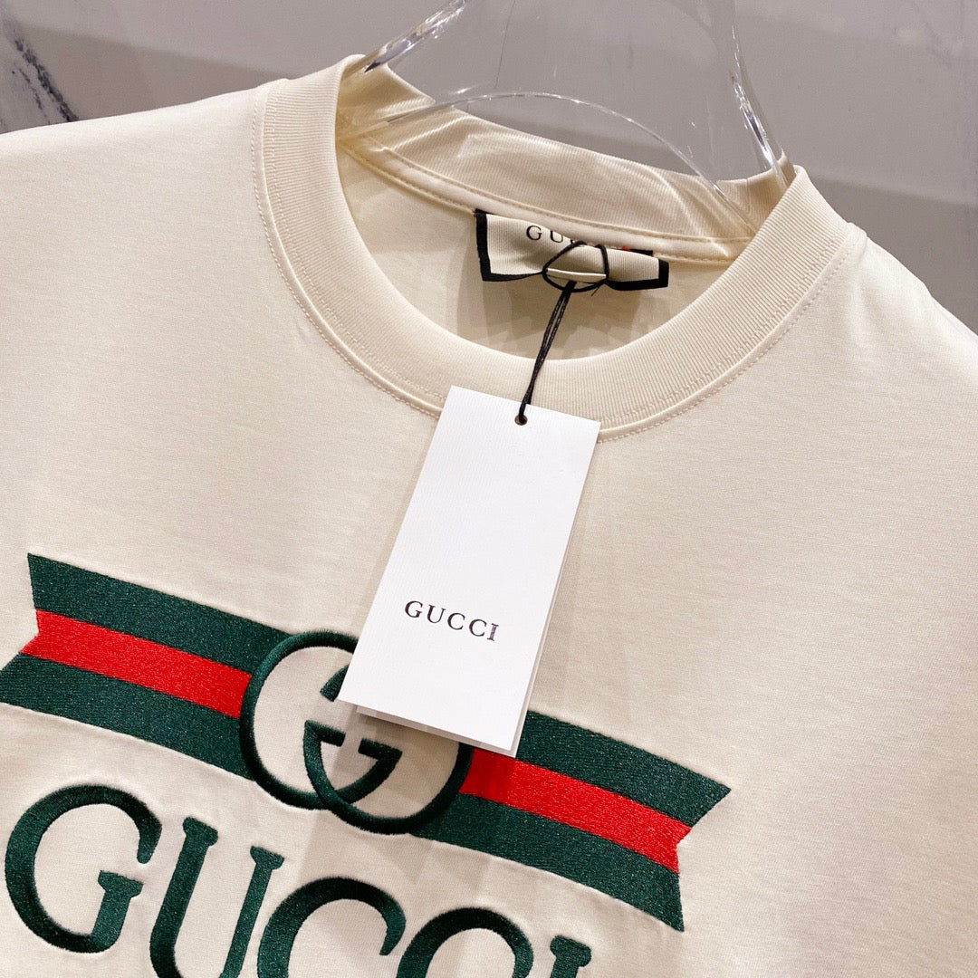 GUCCI                                            Blade Logo Printed T-Shirt In Beige