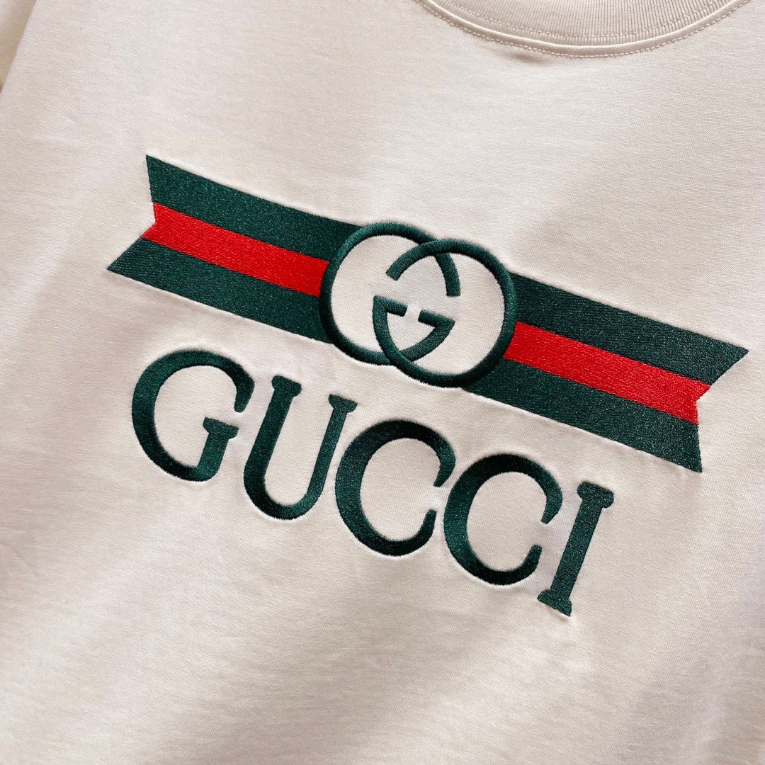 GUCCI                                            Blade Logo Printed T-Shirt In Beige