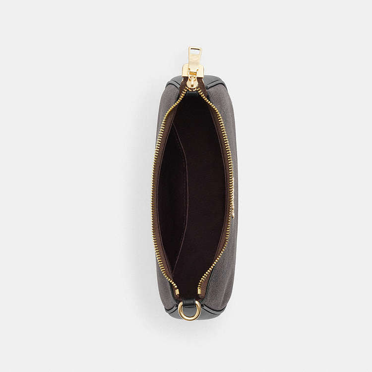 Teri Shoulder Bag
In Signature Canvas