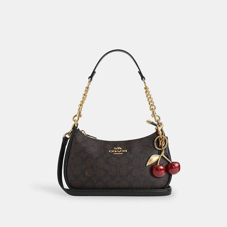Teri Shoulder Bag
In Signature Canvas