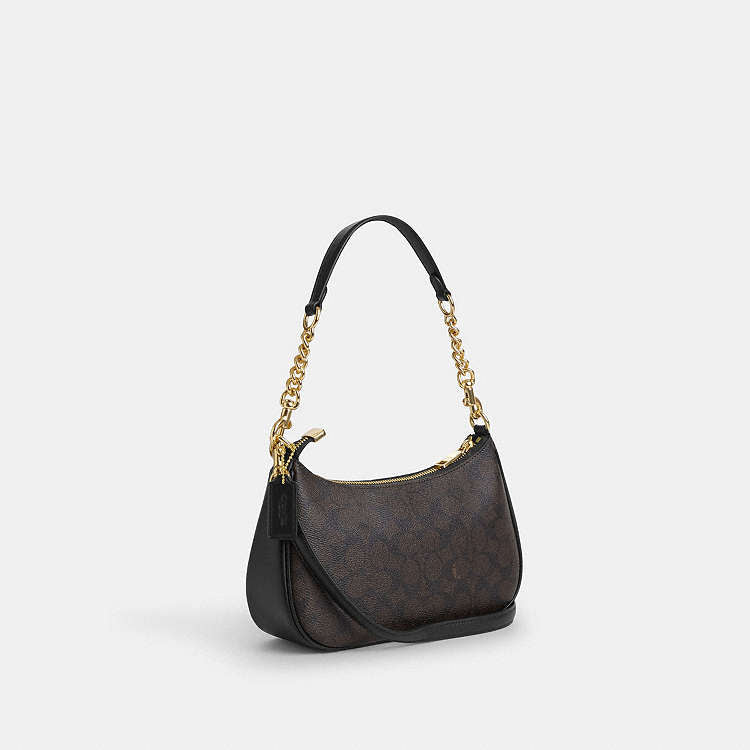 Teri Shoulder Bag
In Signature Canvas Techwosell