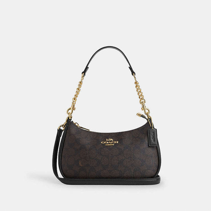 Teri Shoulder Bag
In Signature Canvas