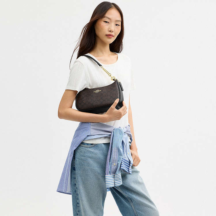 Teri Shoulder Bag
In Signature Canvas Techwosell