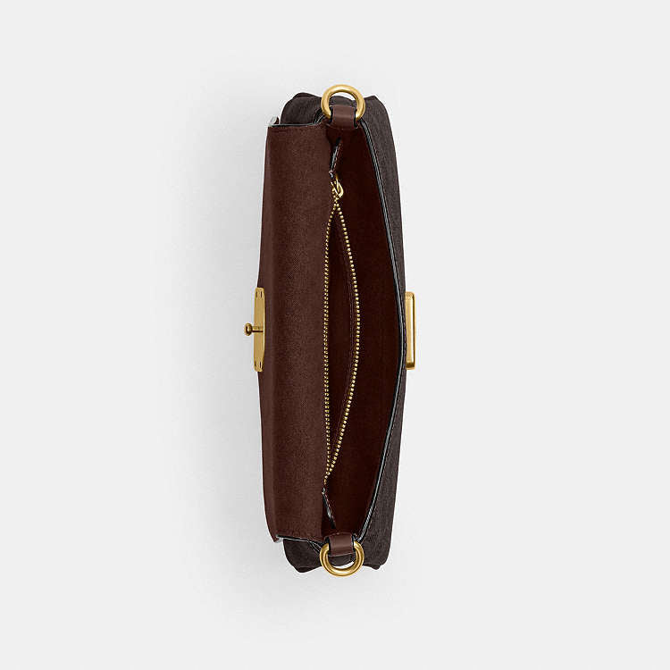 Jet Shoulder Bag
In Signature Canvas