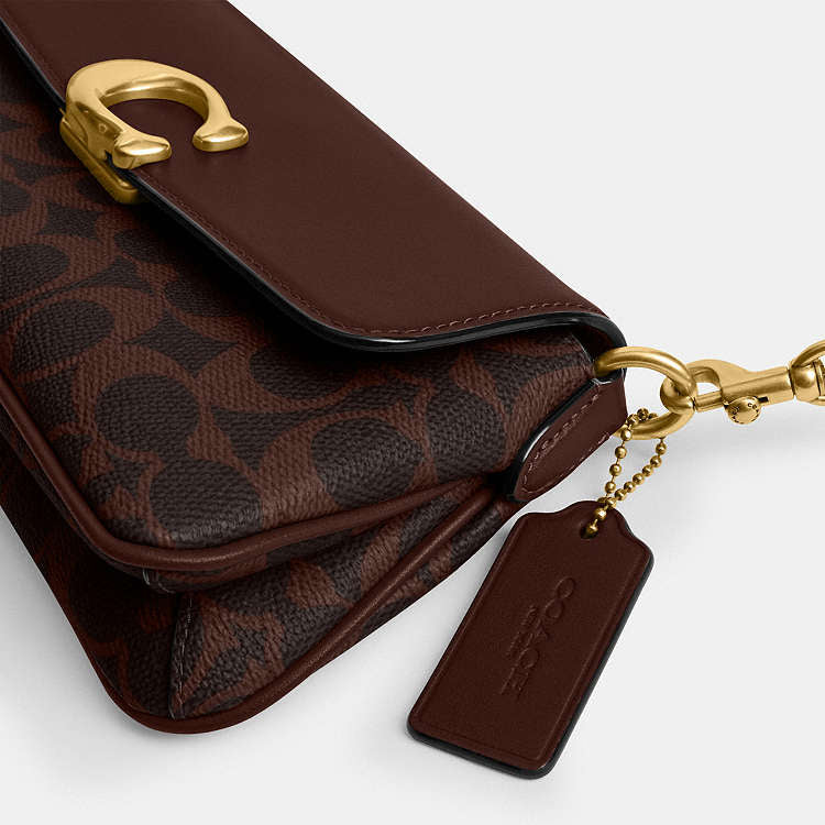 Jet Shoulder Bag
In Signature Canvas Techwosell